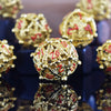 Orb of the Dragon Hollow Metal Dice Set - Gold and Red