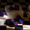 Burnt Orange with Blue Irregular Pattern Fill: 7-Piece Acrylic Dice Set