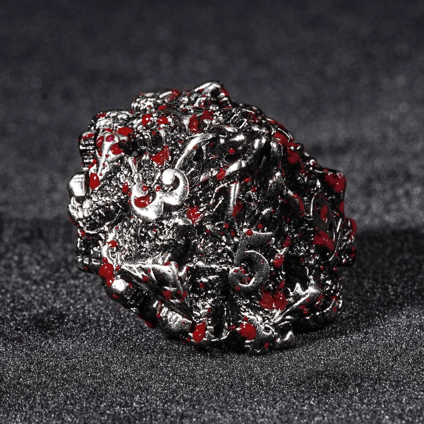 Bloodstained dragon head shaped metal hollow DND dice set