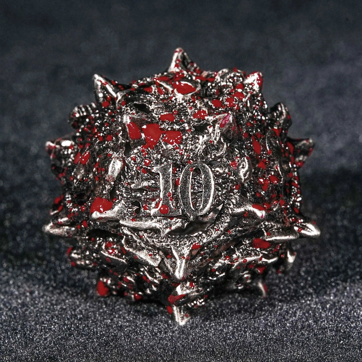 Bloodstained dragon head shaped metal hollow DND dice set