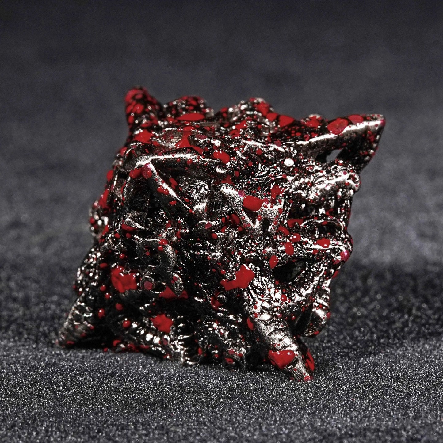 Bloodstained dragon head shaped metal hollow DND dice set