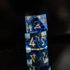 Corpse Blue and Gold Sharp-Edged Resin Dice Set