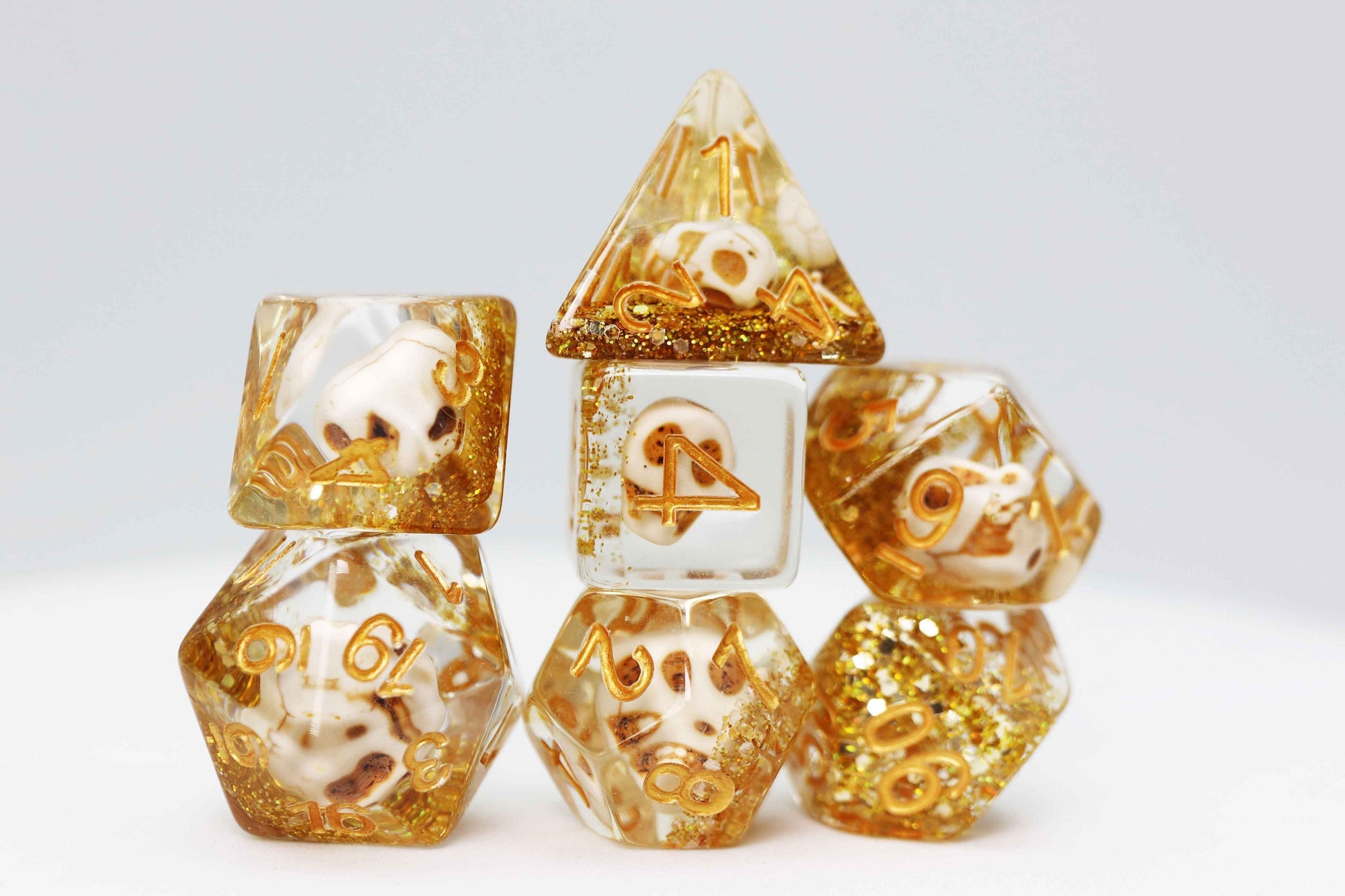 Skull and Gold Glitter RPG Dice Set | 7-Piece Polyhedral Dice for TTRPGs