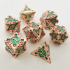 Rose Gold w/green Barbed Strengthened Metal 7-Dice Set | Metal DND Dice