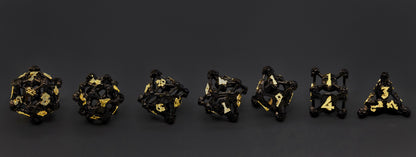 Black w/Gold Deadly Skull Dice Hollow Metal 7-Dice Set