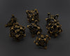Gold Deadly Skull Dice Hollow Metal 7-Dice Set
