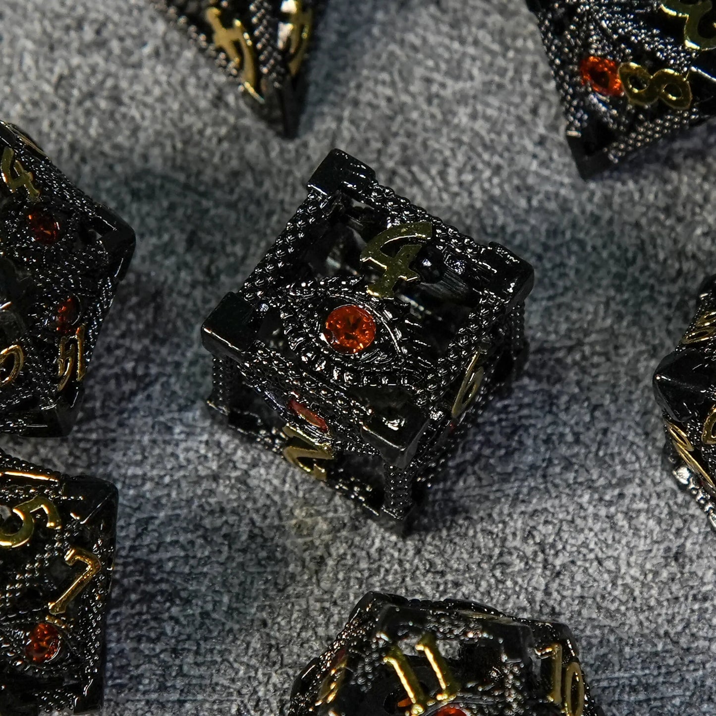 Devil's Eye Ruby Metal Hollow DND Dice Set with Gold Numbers