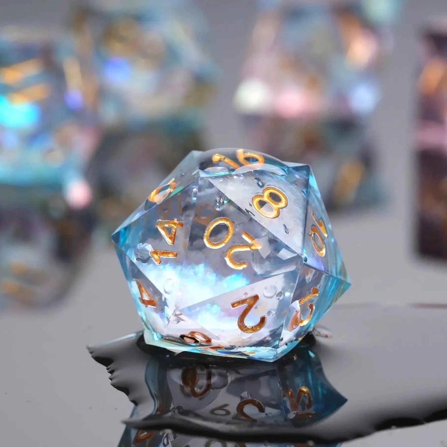 Transparent powder blue resin sequin liquid core dice set with gold numbers