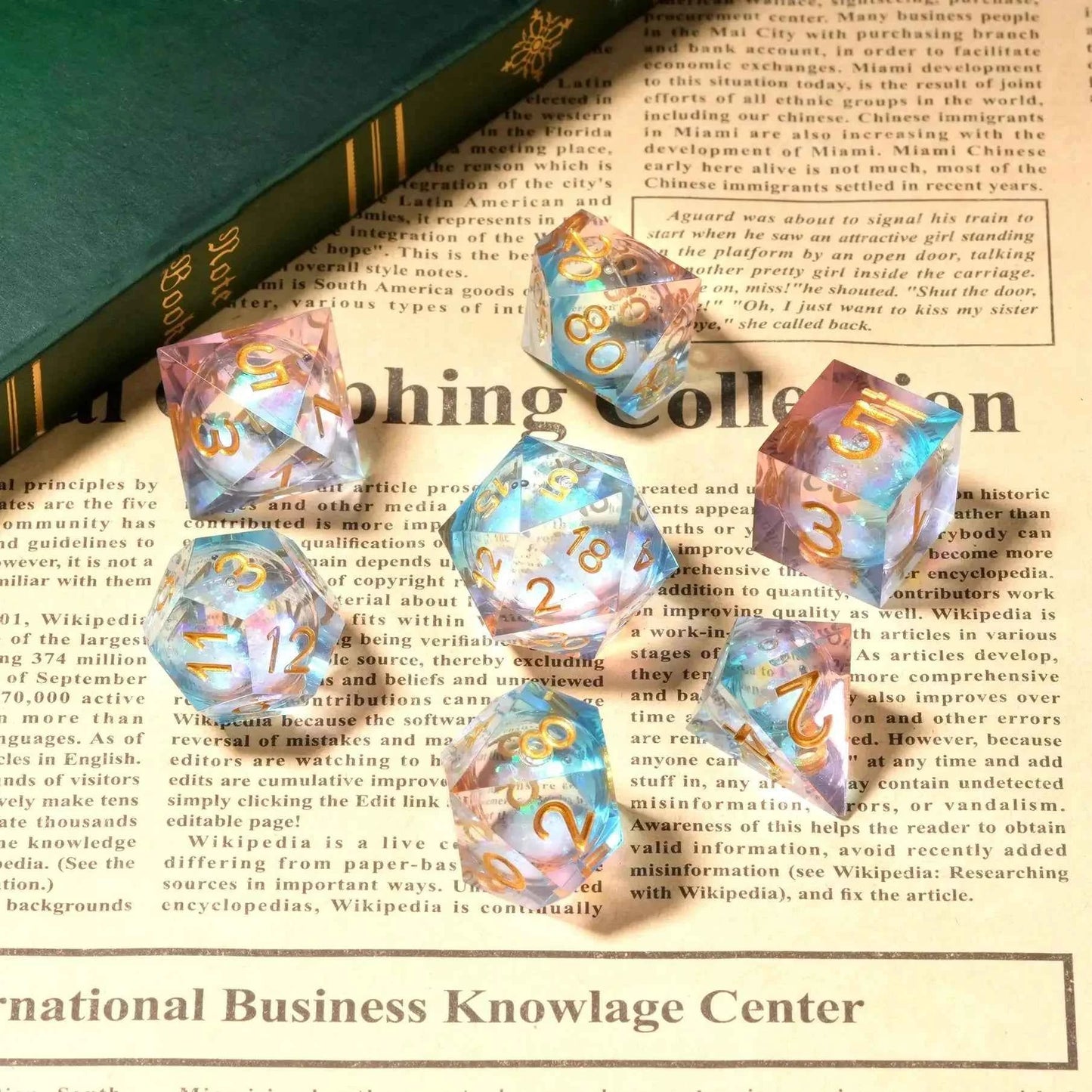 Transparent powder blue resin sequin liquid core dice set with gold numbers