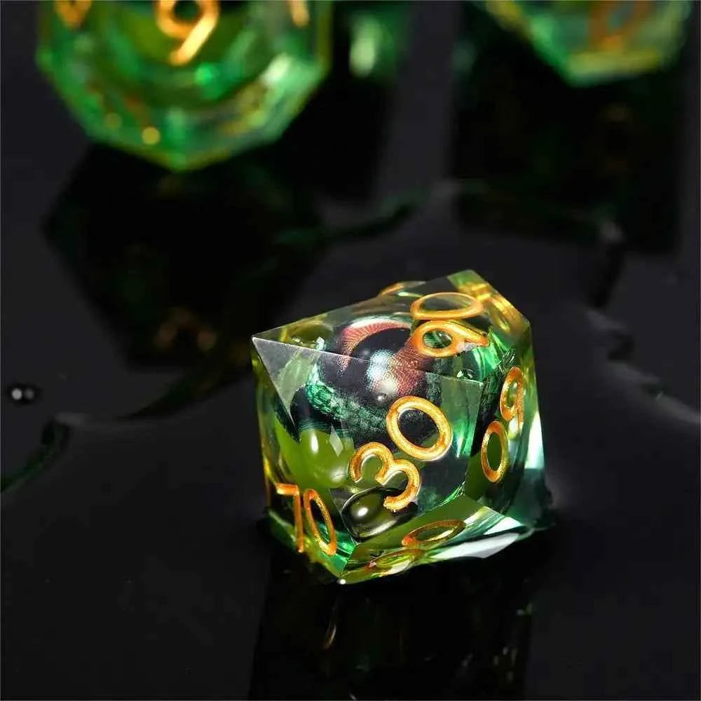 Fierce Crocodile Eyes Liquid Core Resin DND Dice Set + Gold Lettering