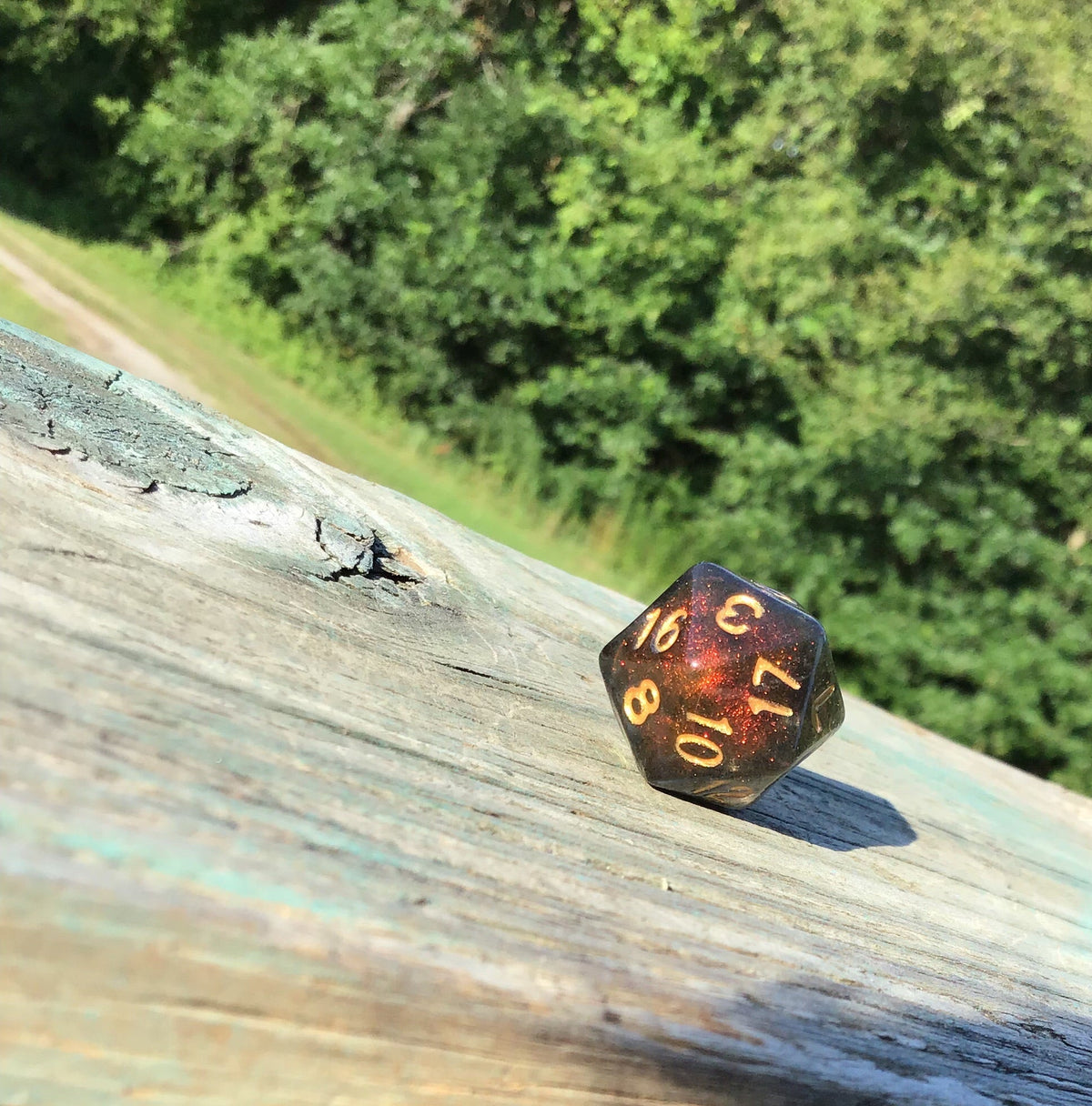 Caleb Widogast Inspired D20 – Handmade Blood-Red Color-Shifting Gaming Die with Holographic Flame