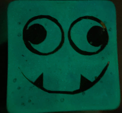 Tusktooth Fjord Inspired D6 – Handmade Glow-in-the-Dark Green & Blue Gaming Die with Gold Grinning Face