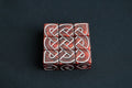 9 Crossed Knot Dice (Red or Sand)